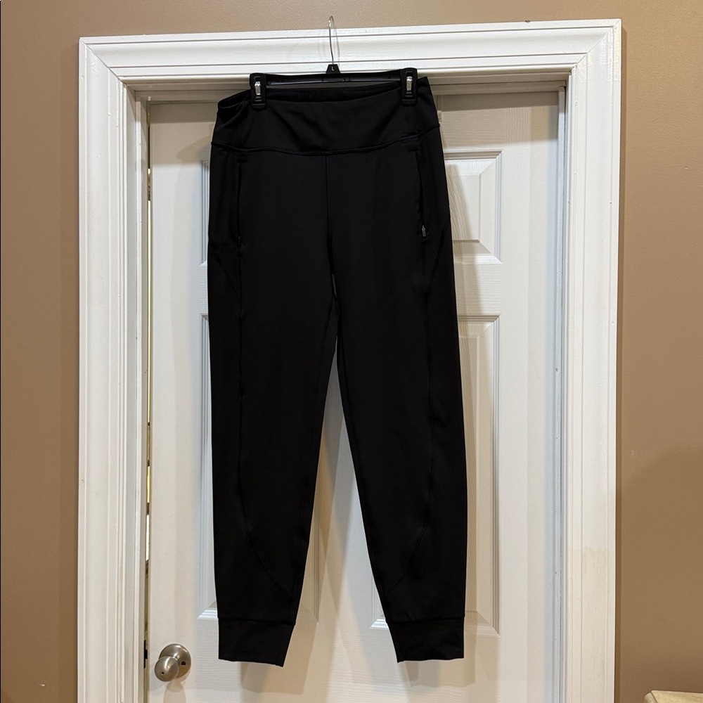 Athleta rainier black Jogger Pants. Fleece lined. Sz med TALL. Like new.